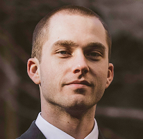 Portrait of Thomas Whitfield, crypto market analyst and trading expert